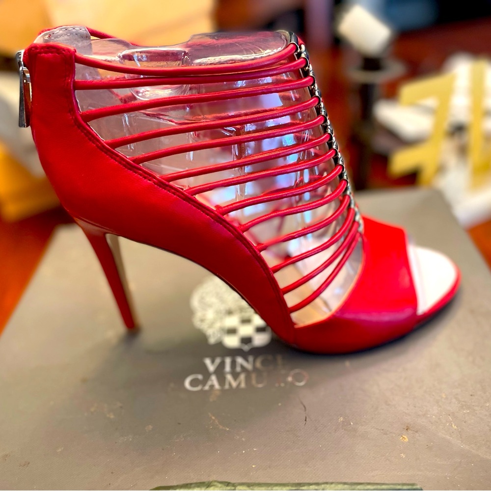 Beautiful red high heeled shoes never been worn.